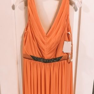 Brand new, never worn, with tags. Size 6.